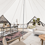 23 avalon optimus bell tent interior image set up with a carpet and furniture